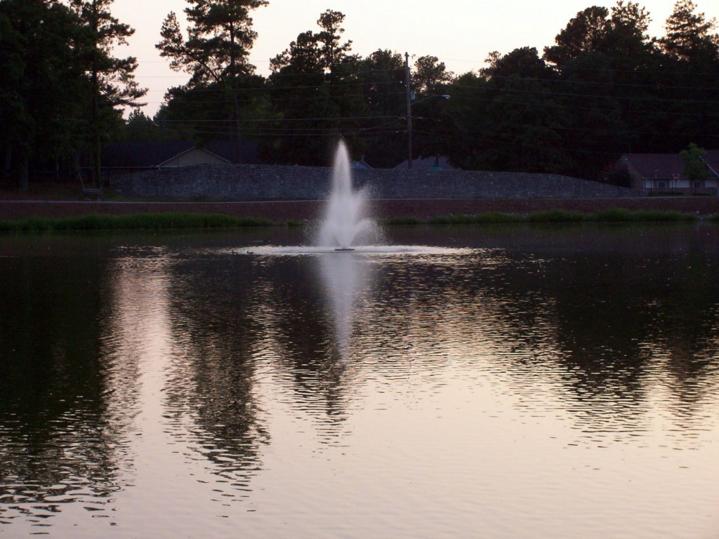 Fountain in a calm pond